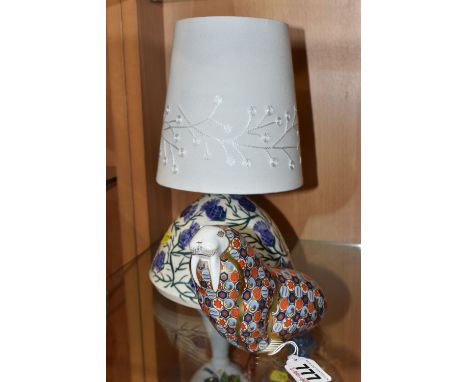 TWO PIECES OF CERAMICS, comprising a Royal Crown Derby Walrus paperweight (extensively restored, missing stopper), and a Crai