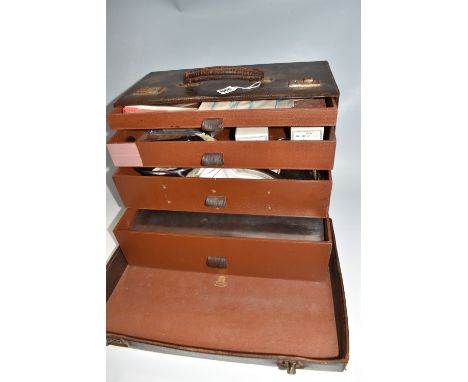 A VINTAGE ARNOLD AND SONS CASED TRAVELLING MIDWIFERY SURGICAL EQUIPMENT SET with four internal drawers holding gynaecological