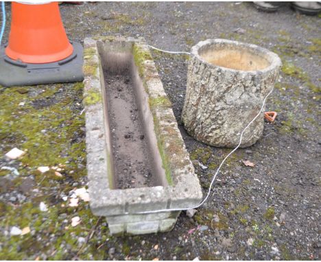 TWO MODERN GARDEN PLANTERS, comprising of a hollowed tree stump stamped Sanford stone, height 29cm, and an oblong planter