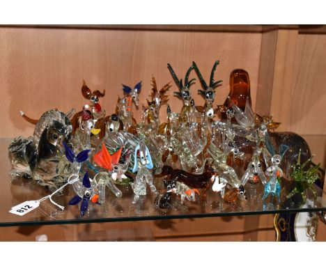 A COLLECTION OF ART GLASS ANIMALS to include various dogs, deer, horses, a Pegasus, assorted fish, a Wedgwood amber otter and
