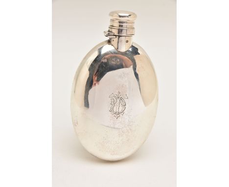 A LATE VICTORIAN SILVER HIPFLASK, by Sampson Mordan &amp; Co, of a polished oval form, engraved monogram, twist lock cover, h