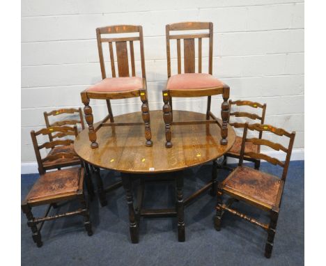 A 20TH CENTURY OAK GATE LEG TABLE, raised on turned legs, united by stretchers, open width 137cm x closed length 50cm x depth