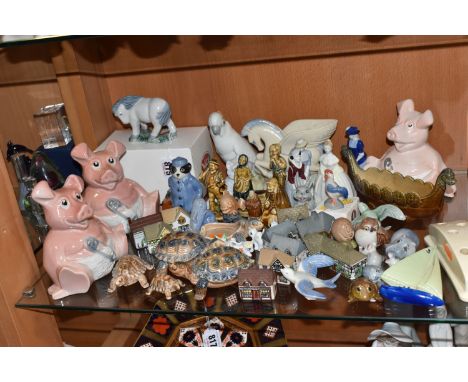 A LARGE COLLECTION OF WADE ITEMS to include two NatWest 'Woody' piggy banks and a similar unmarked model, two tortoise trinke