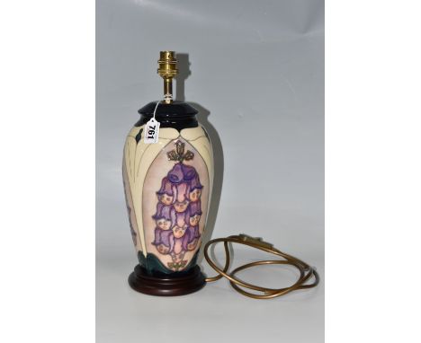 A MOORCROFT POTTERY FOXGLOVE PATTERN TABLE LAMP, designed by Rachel Bishop, tube-lined with purple and pink foxglove flowers,