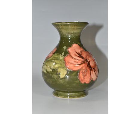 A MOORCROFT POTTERY 'CORAL HIBISCUS' VASE, with flared neck, tube-lined with coral pink Hibiscus flowers on a green ground, i
