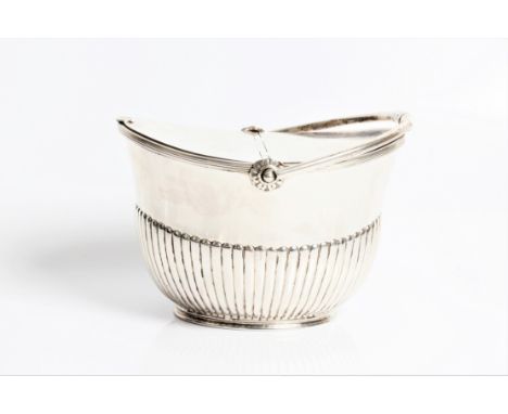 A George III silver tea caddy of basket oval form with two compartments with locks, and marks for London 1812 and maker Benj.