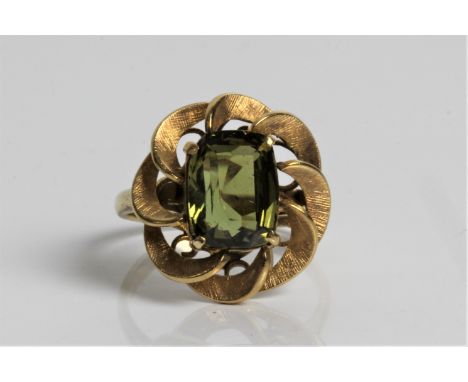 A chrysoberyl dress ring, marked 18ct gold, ring size N 1/2, approx. weight 4.8gms. Important: Online viewing and bidding onl