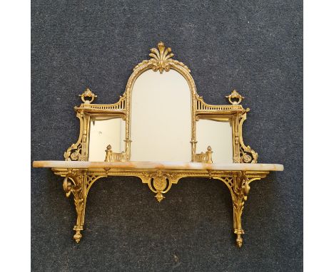 An onyx and brass wall mounted mirror back shelf unit. IMPORTANT: Online viewing and bidding only. Collection by appointment 