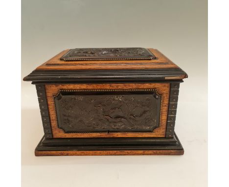 An oak five cigar shelf humidor with hunting scene panels to sides and top, 33cm x 26cm. IMPORTANT: Online viewing and biddin