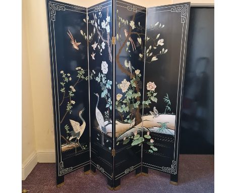 A black painted oriental four panelled fire screen decorated with red headed cranes and roses. IMPORTANT: Online viewing and 