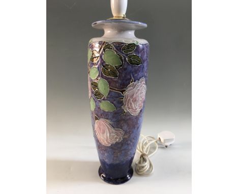 A Royal Doulton lamp base converted from vase, with rose design on purple background, height 44cm Important: Online viewing a