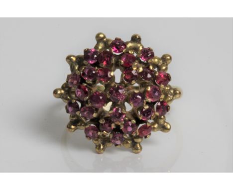 A yellow gold pink sapphire flower design cluster ring, marked 14K, ring size N 1/2, approx. weight 4.5gms. Important: Online