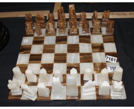 Marble chess set on marble board