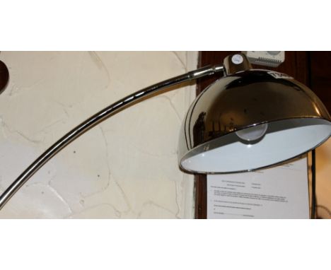 Modern silver coloured room light on stand