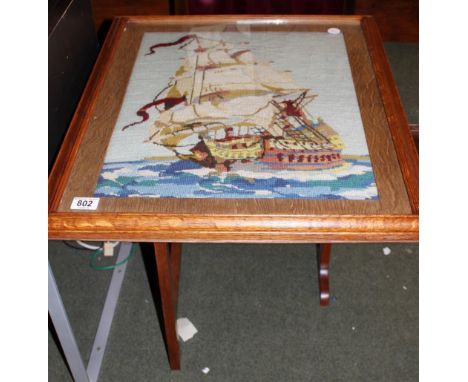Oak firescreen with woolwork galleon
