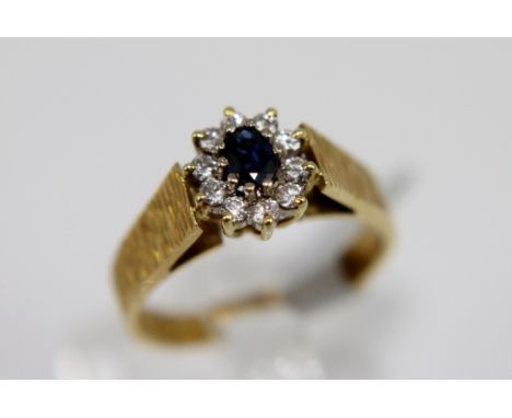 18ct yellow gold sapphire and diamond ring, size M