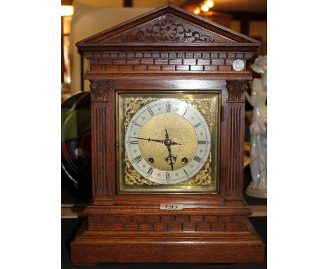 Oak bracket clock with corinthiam columns and double strike movement to W.H & Sons, with key and pendulum, H ~ 42cm