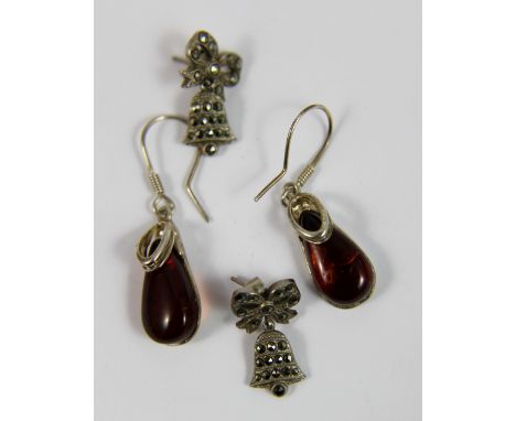 Two pairs of sterling silver earrings, marcasite pair and amber drops