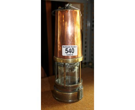 Copper miners lamp by Richard Johnson, Clapham & Morris, Manchester