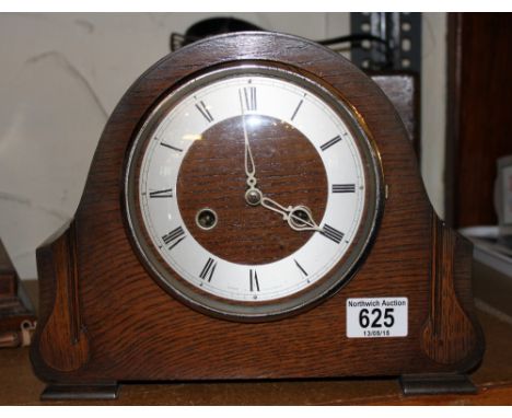 Oak cased chiming mantel clock
