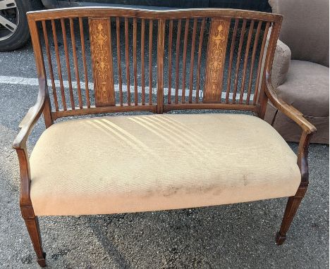 An Edwardian rosewood two seater bench having a slat back and with marquetry inlayLocation:If there is no condition report sh