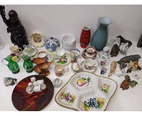 Ceramics and glassware, a Poole pottery vase, a Mary Gregory glass vase, a glug glug decanter, Nao and other model animals, a