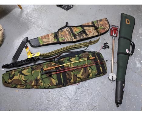 A group of three fabric gun slip cases to include a Browning case, a Shotgun Valu-Sling and a cartridge belt, three riding cr