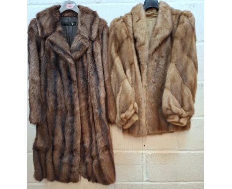 Two mid to late 20th Century fur coats to include a light brown mink with mutton sleeves, approx 40" chest x 28" long. Locati