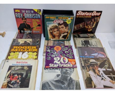 A collection of mostly Rock and Pop LP's to include several Bob Dylan examples, 'The Grease Soundtrack', 'Elton John Greatest