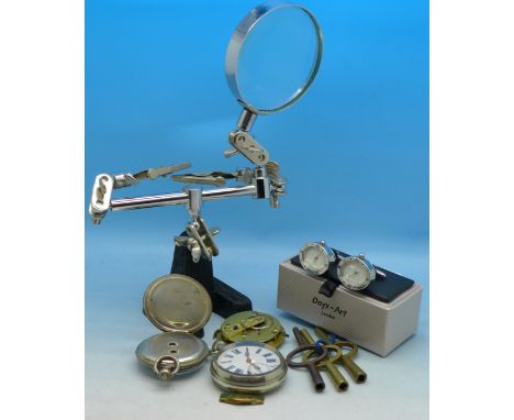 Two fob watches, clock keys, a pair of watch cufflinks, a magnifying glass and a movement