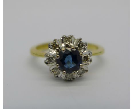 An 18ct gold, blue/green stone and diamond ring, 3.5g, K