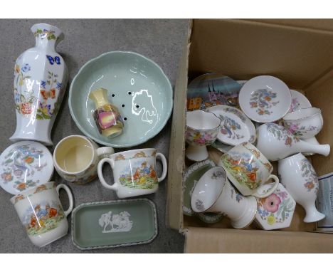 A collection of Wedgwood, Royal Doulton Bunnykins, a Clarice Cliff drainer, etc.
