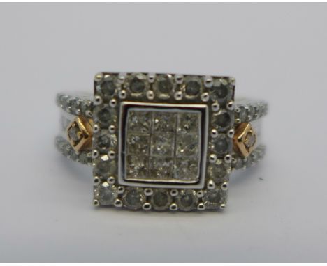A 9ct white gold diamond cluster ring, 4.7g, K