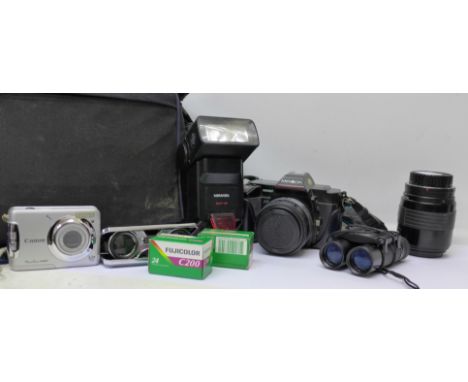 A Minolta 5000 camera, a Sigma lens, a case, etc.