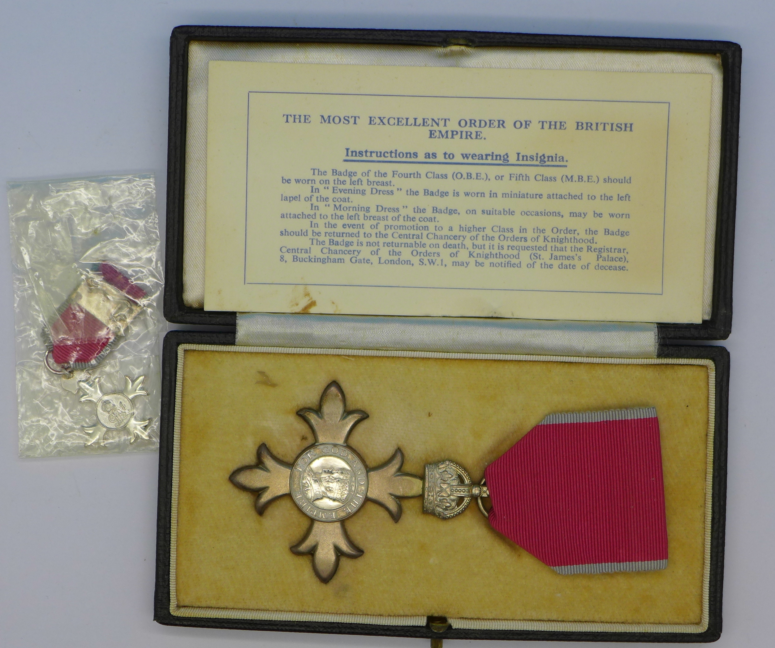 An MBE medal and ribbon in original presentation case with miniature