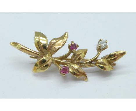 A 9ct gold, ruby and diamond brooch, 2.2g