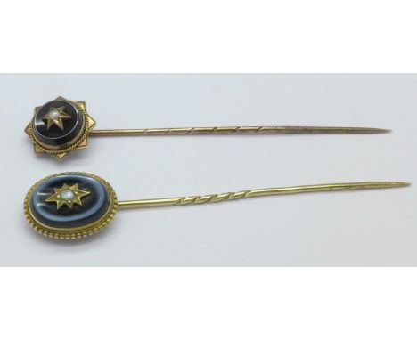 Two yellow metal stick pins, 4.8g