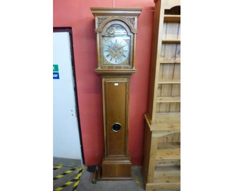 A walnut 8-day longcase clock, the square brass dial signed Richard Fennell, Kensigton, 217cms h 