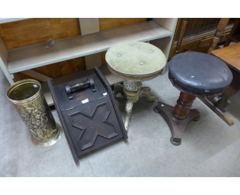 Two revolving piano stools, Edward VII oak coal scuttle and a brass stick stand 