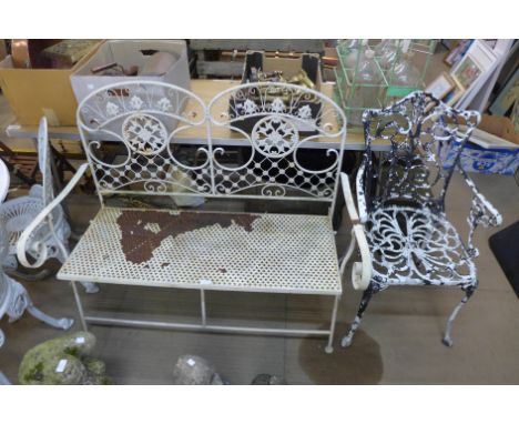 A painted metal folding garden bench and a chair 