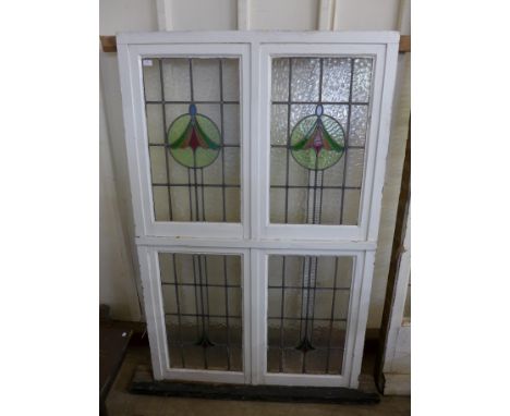 An Art Deco stained glass four panel window 