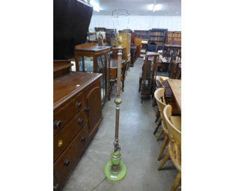 A faux onyx and metal standard lamp 