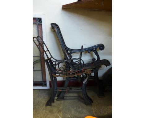 Two pairs of cast steel bench ends 