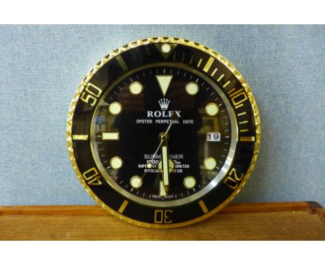 A Rolex style dealer's display wall clock 