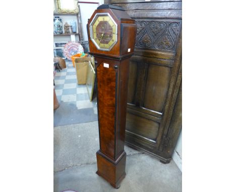 An Art Deco walnut dwarf longcase clock