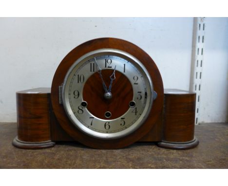 An Art Deco walnut mantel clock 