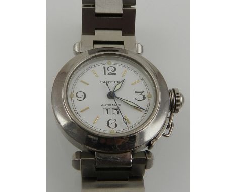 A Cartier stainless steel automatic wristwatch, the white enamel dial with Arabic numerals and baton markers, date aperture t