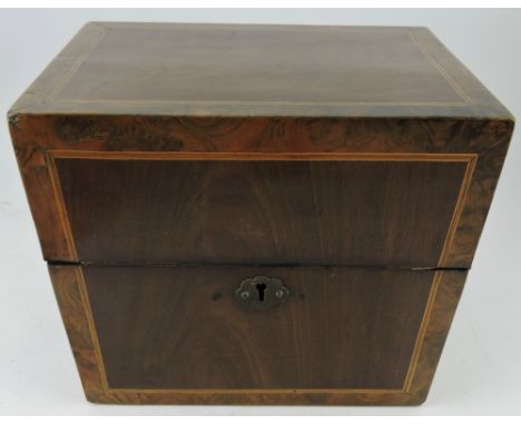 An early 19th Century walnut banded mahogany decanter box with vacant interior, W. 25cm
