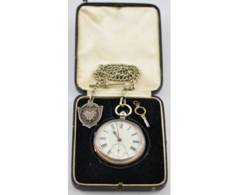 An Edwardian silver cased pocket watch, the white enamel dial marked Roman numerals with subsidiary seconds dial and a watch 