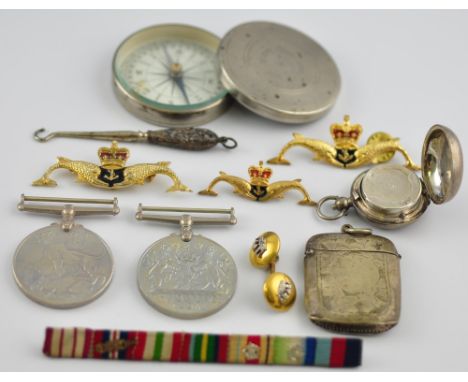 A George V silver sovereign case together with a pocket compass, a vesta, 2 second war defence medals and sundries
